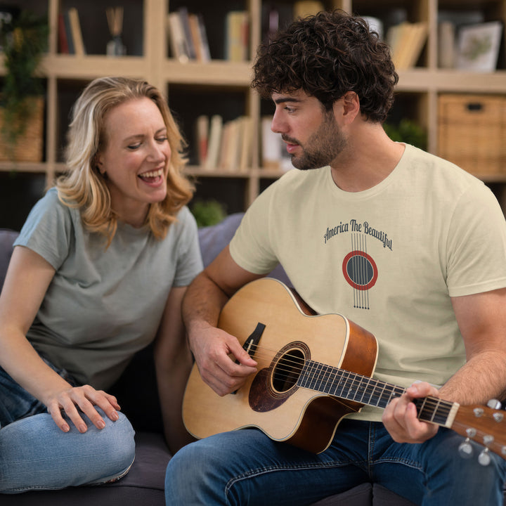Cozy couple, man is wearing a Beige t-shirt with acoustic guitar graphic and &