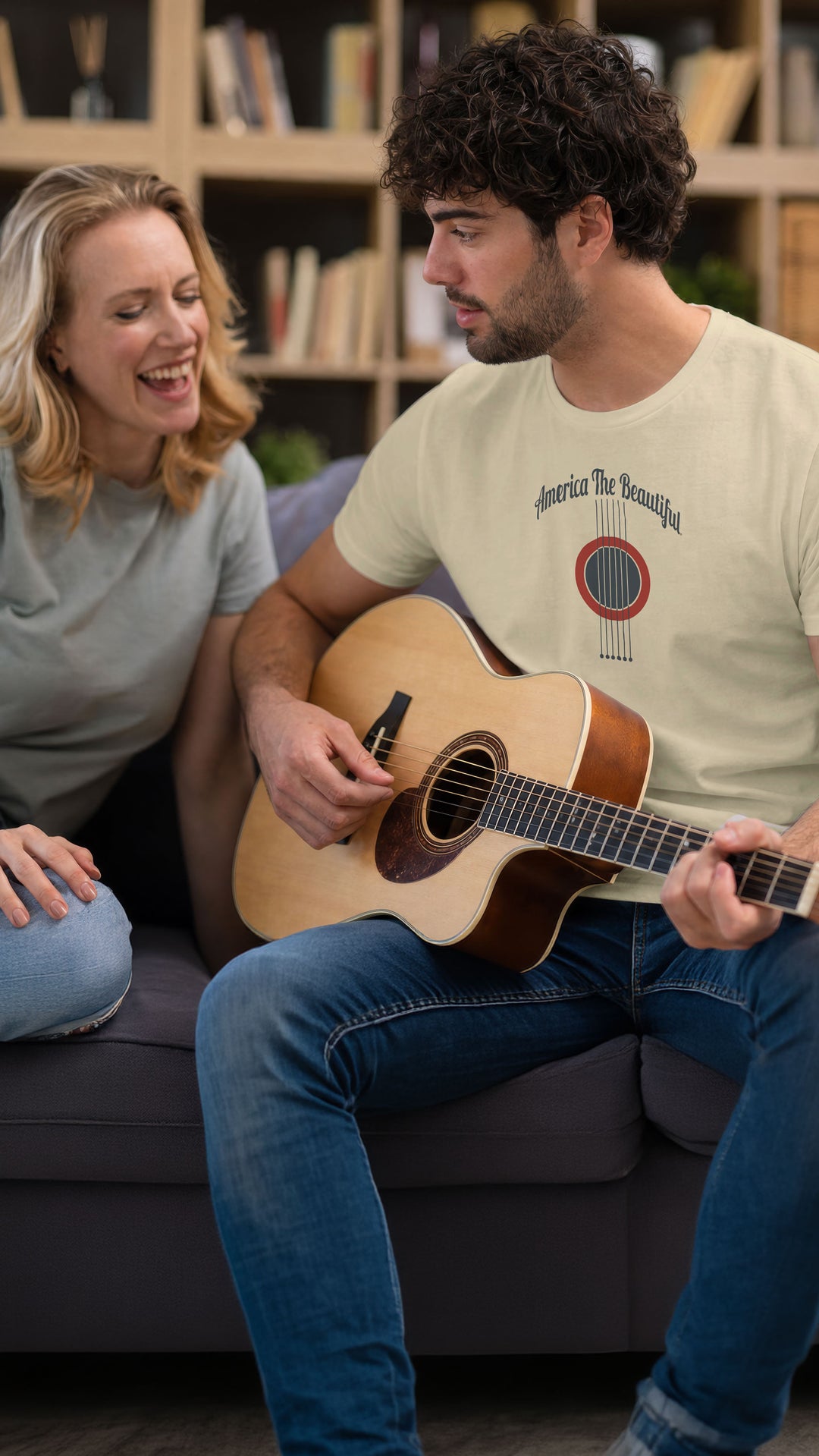 Cozy couple, man is wearing a Beige t-shirt with acoustic guitar graphic and &