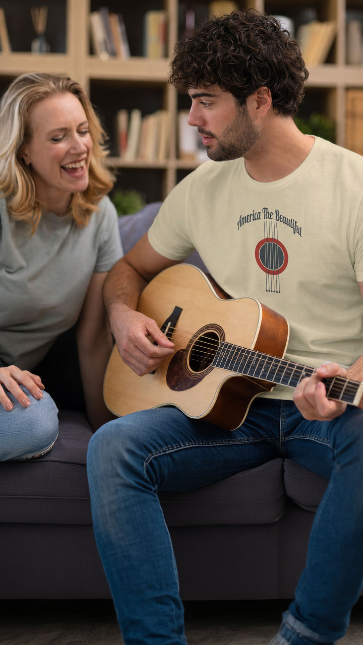 Cozy couple, man is wearing a Beige t-shirt with acoustic guitar graphic and &