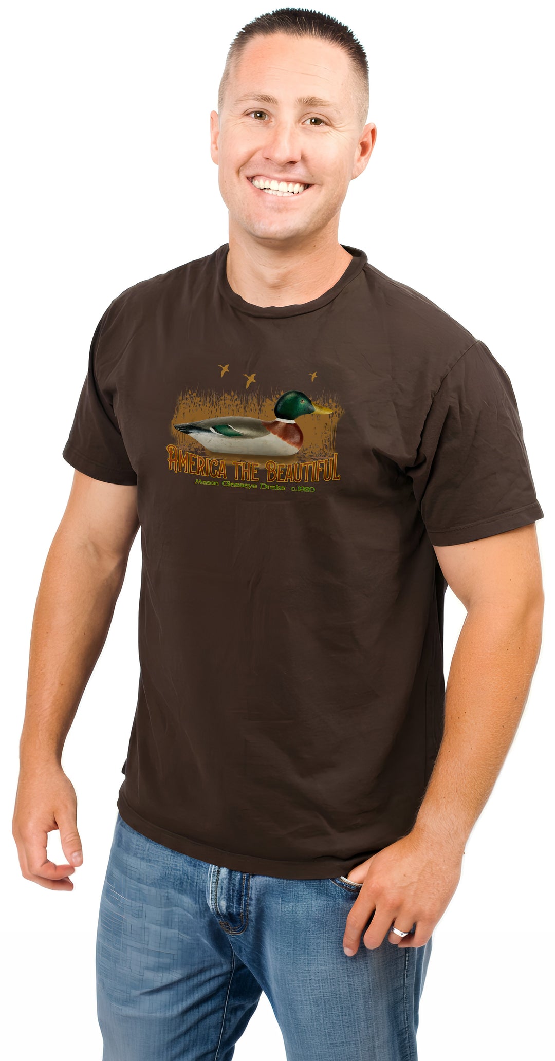 Man wearing a brown t-shirt with a graphic design on a white background