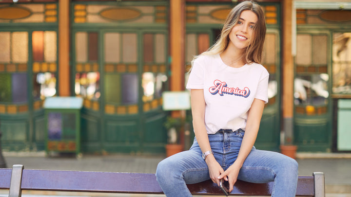 Woman wearing a White t-shirt with &