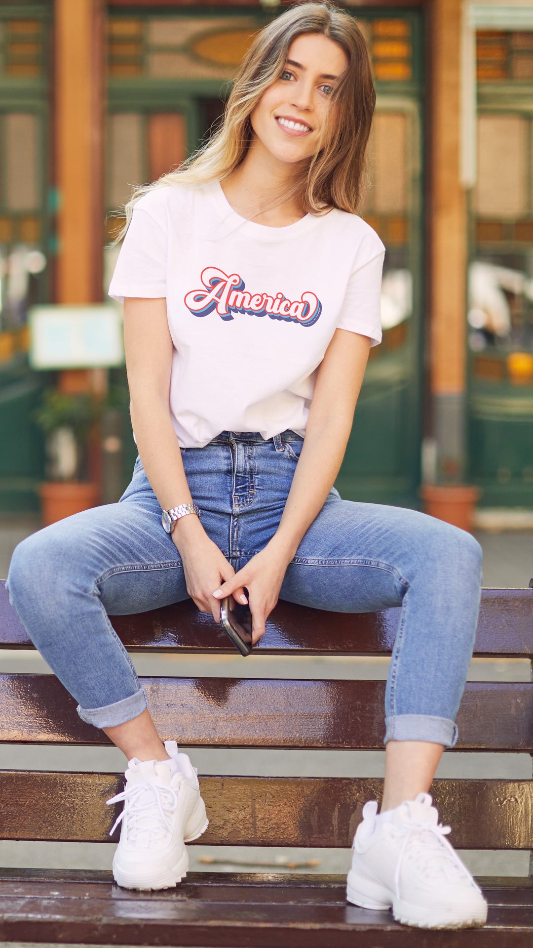 Woman wearing a White t-shirt with &