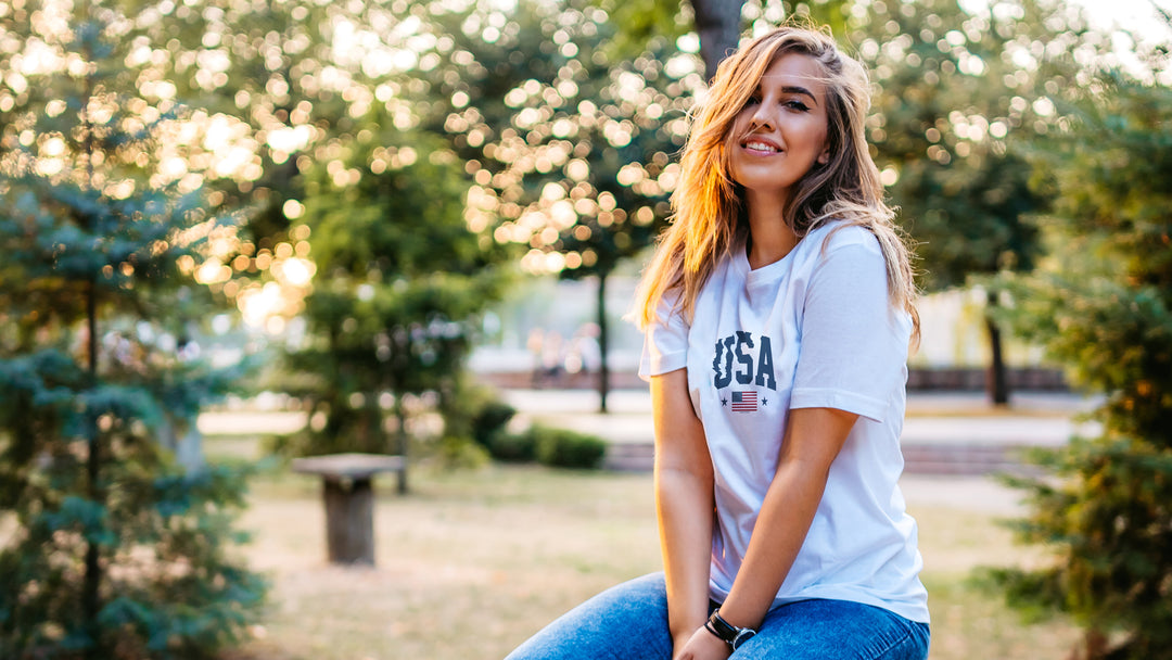 Woman wearing a White t-shirt with &