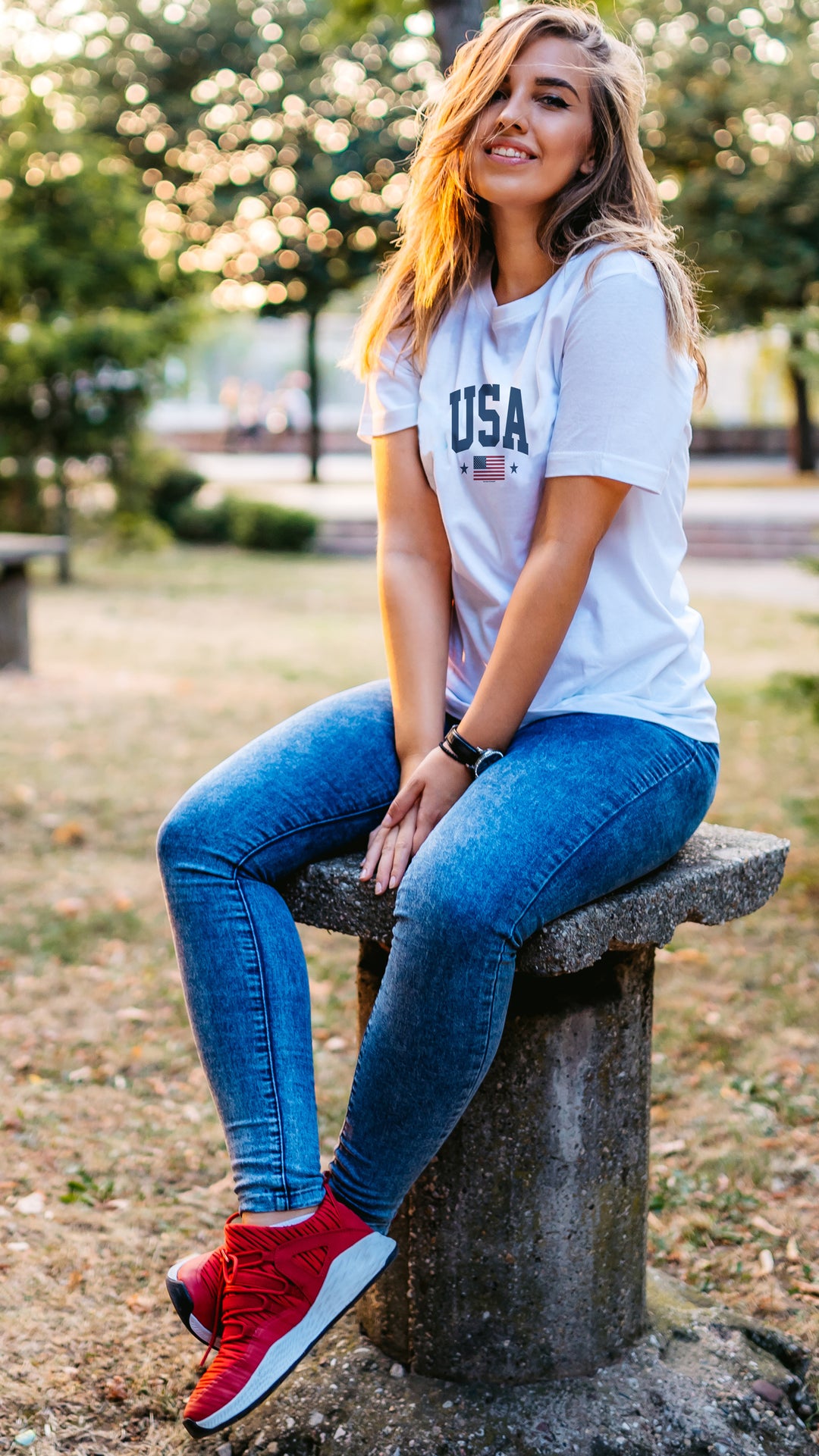 Woman wearing a White t-shirt with &