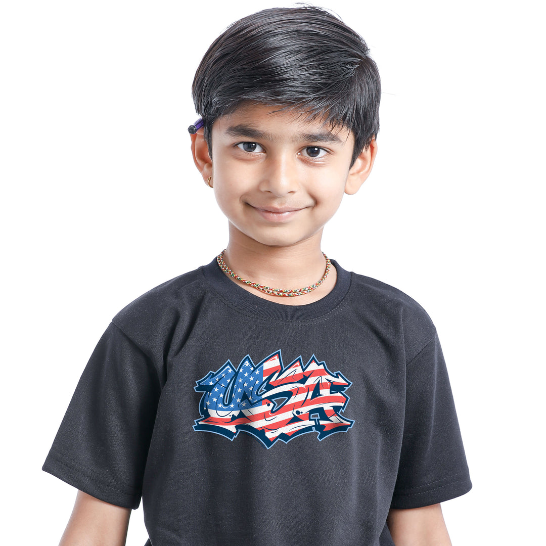 Child wearing a dark gray t-shirt with a graphic design on a white background